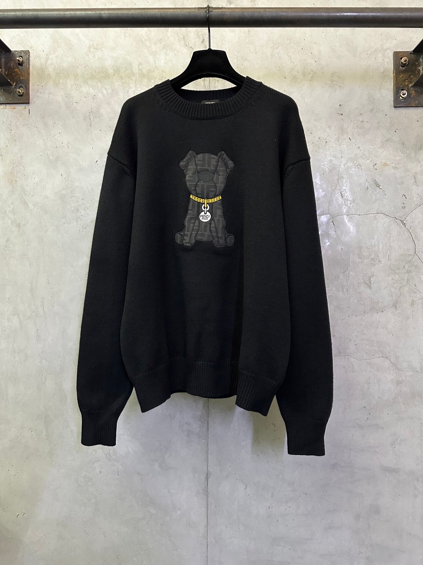 Fendi black knit crewneck sweater with bear graphic and yellow zipper detail
