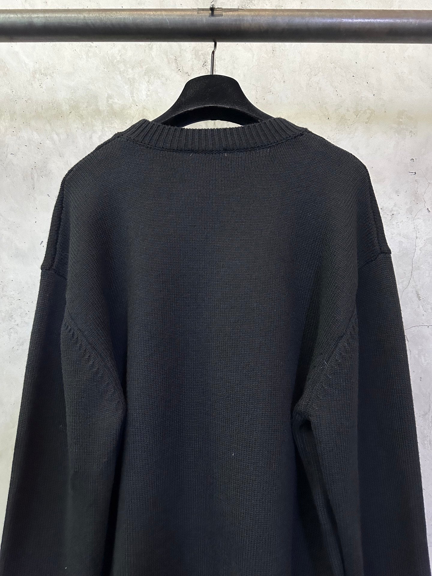 Fendi black knit crewneck sweater back view with ribbed collar and sleeves