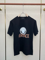 Black crewneck T-shirt with circular Medusa-style emblem and VERSACE text