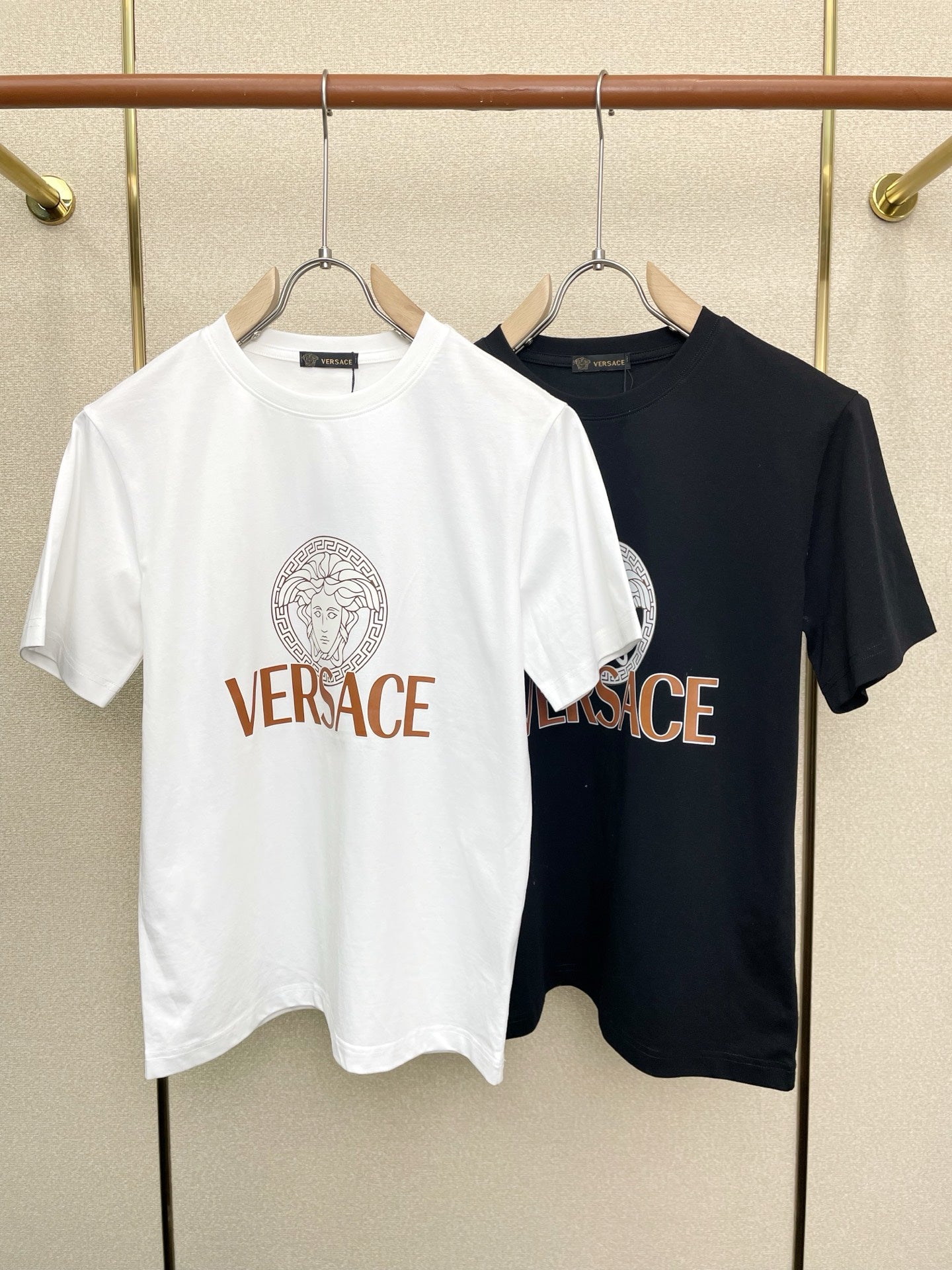 Crewneck T-shirt set in white and dark: front Versace logo prints