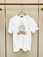 White Versace graphic T-shirt hanging on a hanger