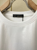 White crewneck T-shirt neckline with interior Versace label