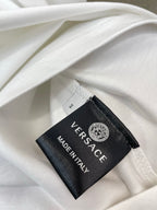 White T-shirt fabric with Versace label reading MADE IN ITALY