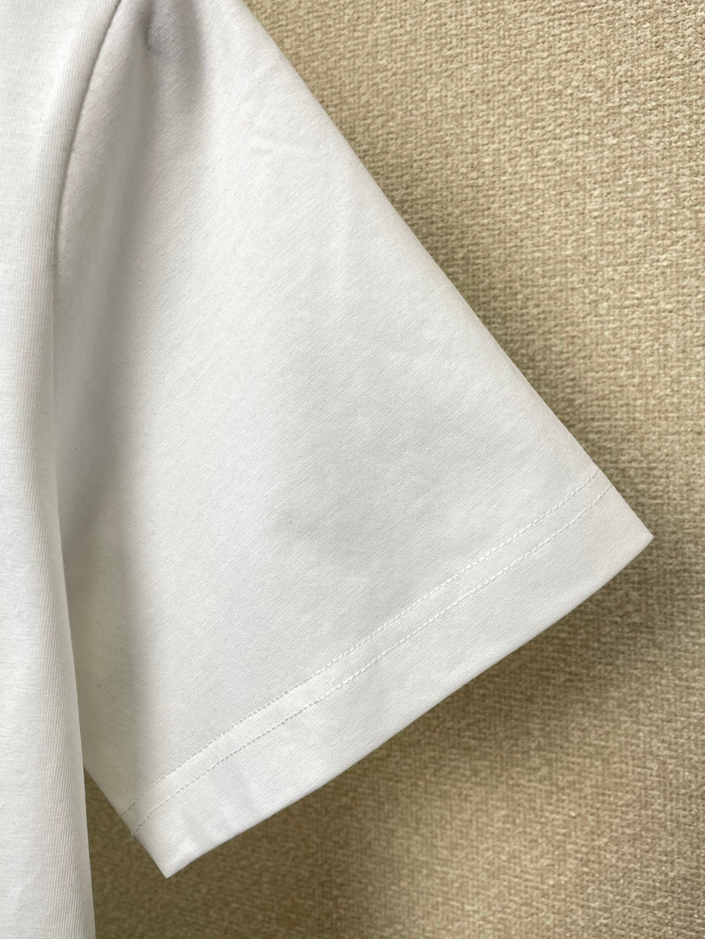 White Versace crewneck T-shirt sleeve and hem with neat stitched finish