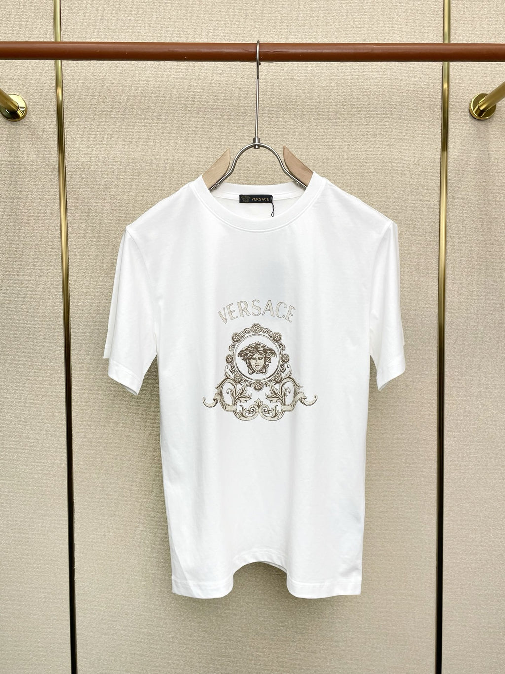 White Versace crewneck T-shirt with VERSACE word and ornate crest print