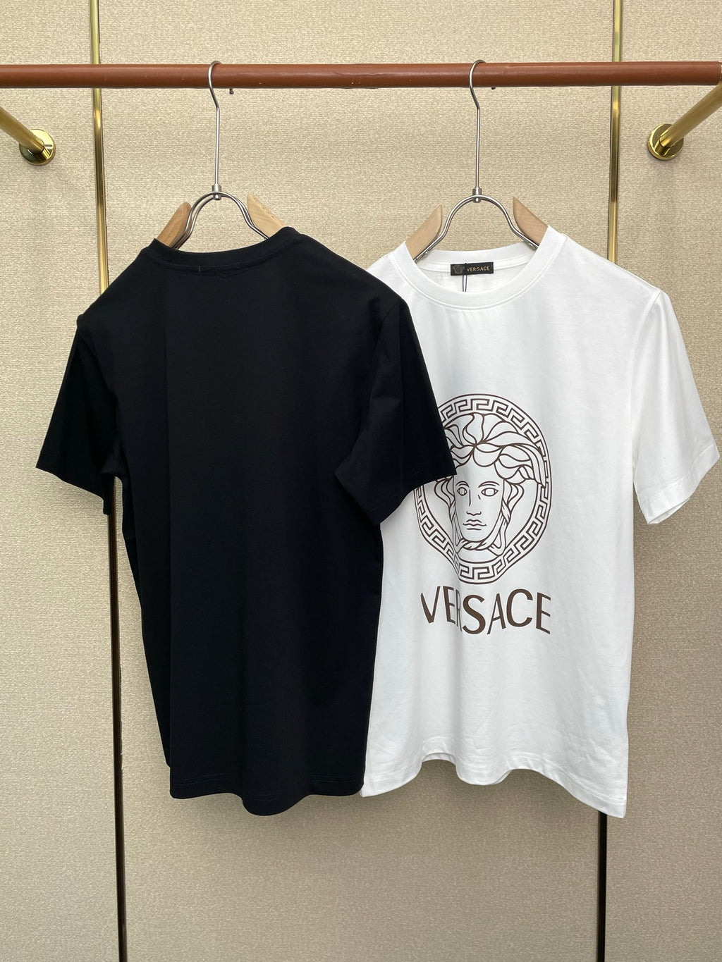 Versace crew-neck T-shirt, dark color, plain back view with no visible front print
