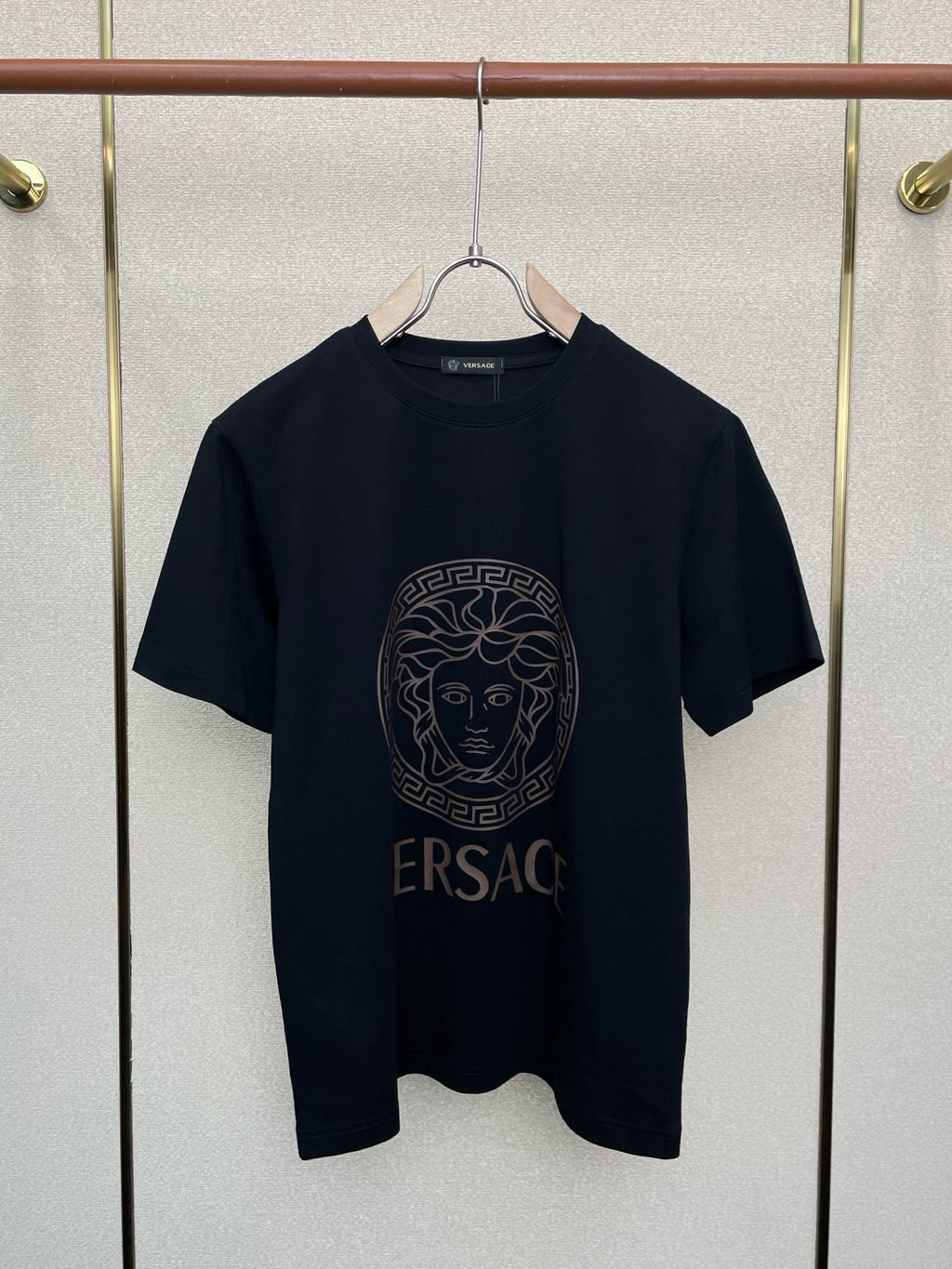 Versace crew-neck T-shirt, dark color, front Medusa emblem graphic with VERSACE text