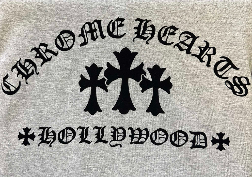 Light gray T-shirt with large black cross and curved lettering graphic