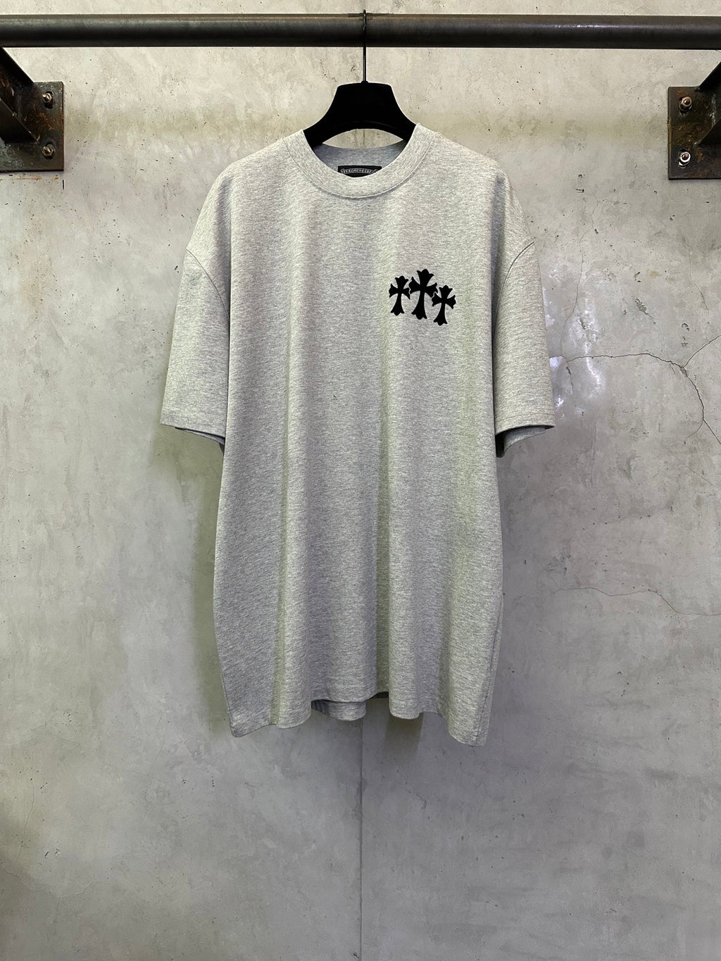 Heather gray graphic T-shirt with black logo print on chest