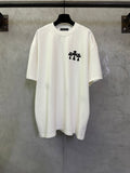 White short-sleeve T-shirt with small black graphic on left chest.