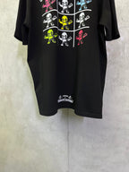 Black crewneck T-shirt with colorful skeleton grid graphic and small hem text