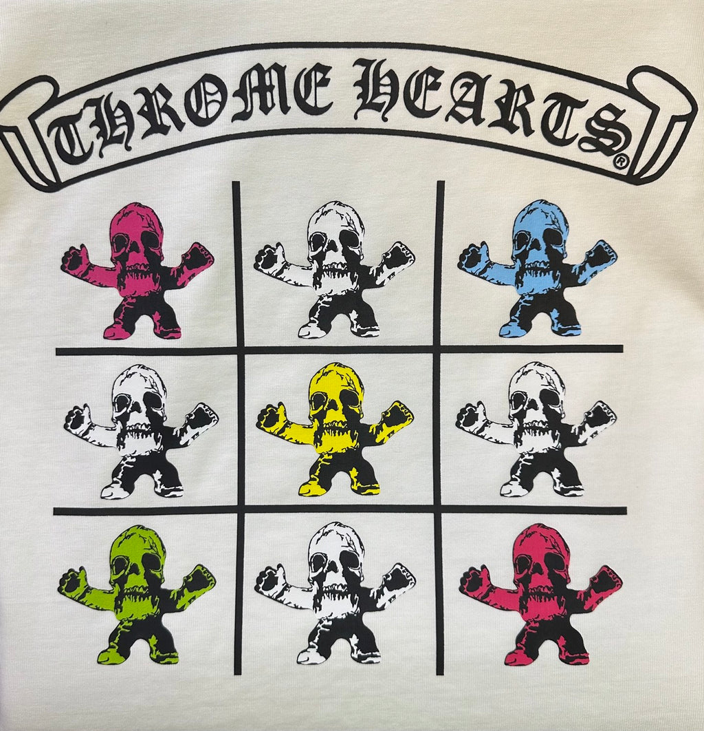 Light short-sleeve T-shirt front with CHROME HEARTS banner and cartoon icons grid