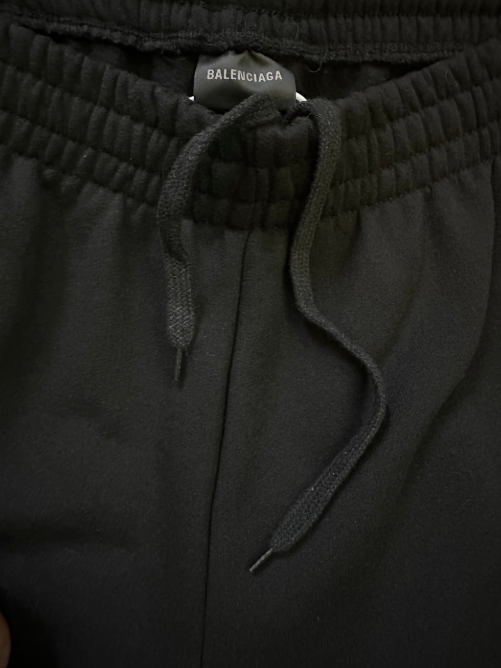 Black drawstring track pants waistband with Balenciaga size label