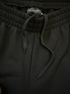 Black drawstring track pants waistband with Balenciaga size label