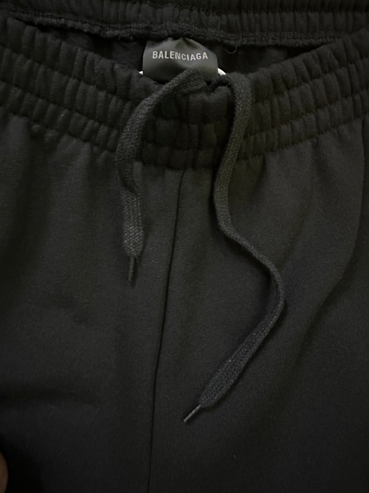 Black drawstring track pants waistband with Balenciaga size label