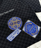 Louis Vuitton knit polo fabric with embroidered blue crest patches