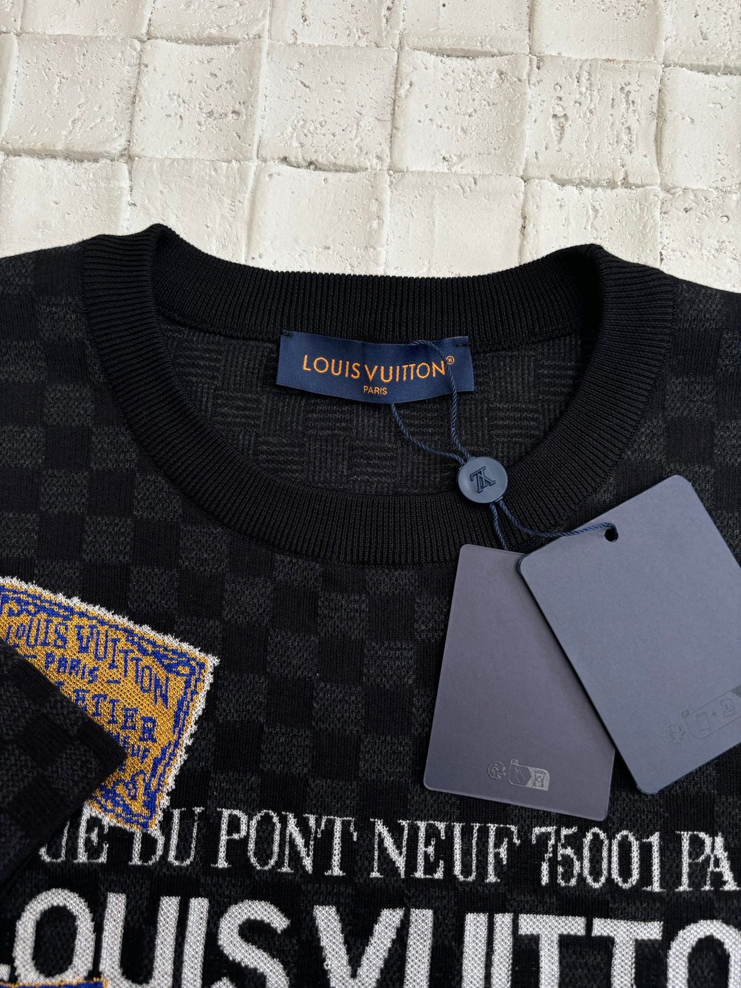 Louis Vuitton knit polo collar with button and checkerboard logo detail