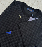 Louis Vuitton checkered knit polo shirt with ribbed collar and button