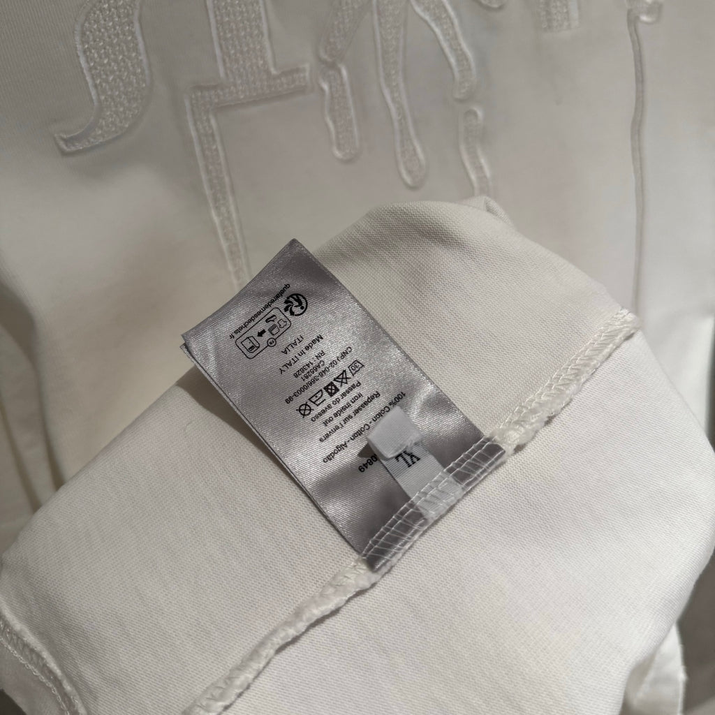 White Dior T-shirt with care label on inner collar seam