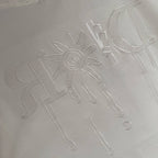 White Dior T-shirt graphic logo embossed across chest