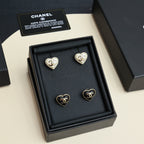 Chanel heart-shaped stud earring set in black display box with four pairs