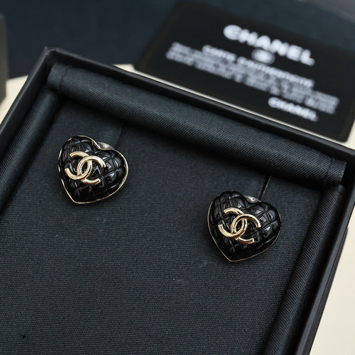 Chanel heart stud earrings: black enamel with gold CC logo, in box