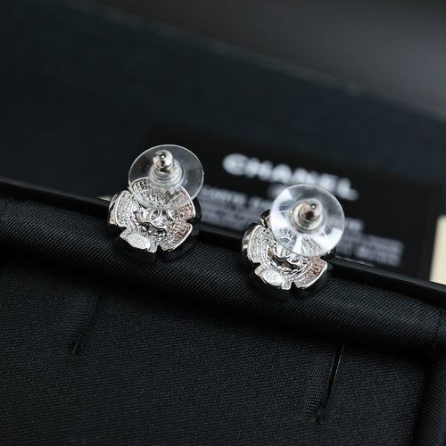Chanel floral stud earrings with pearl, silver-tone filigree flower, round posts