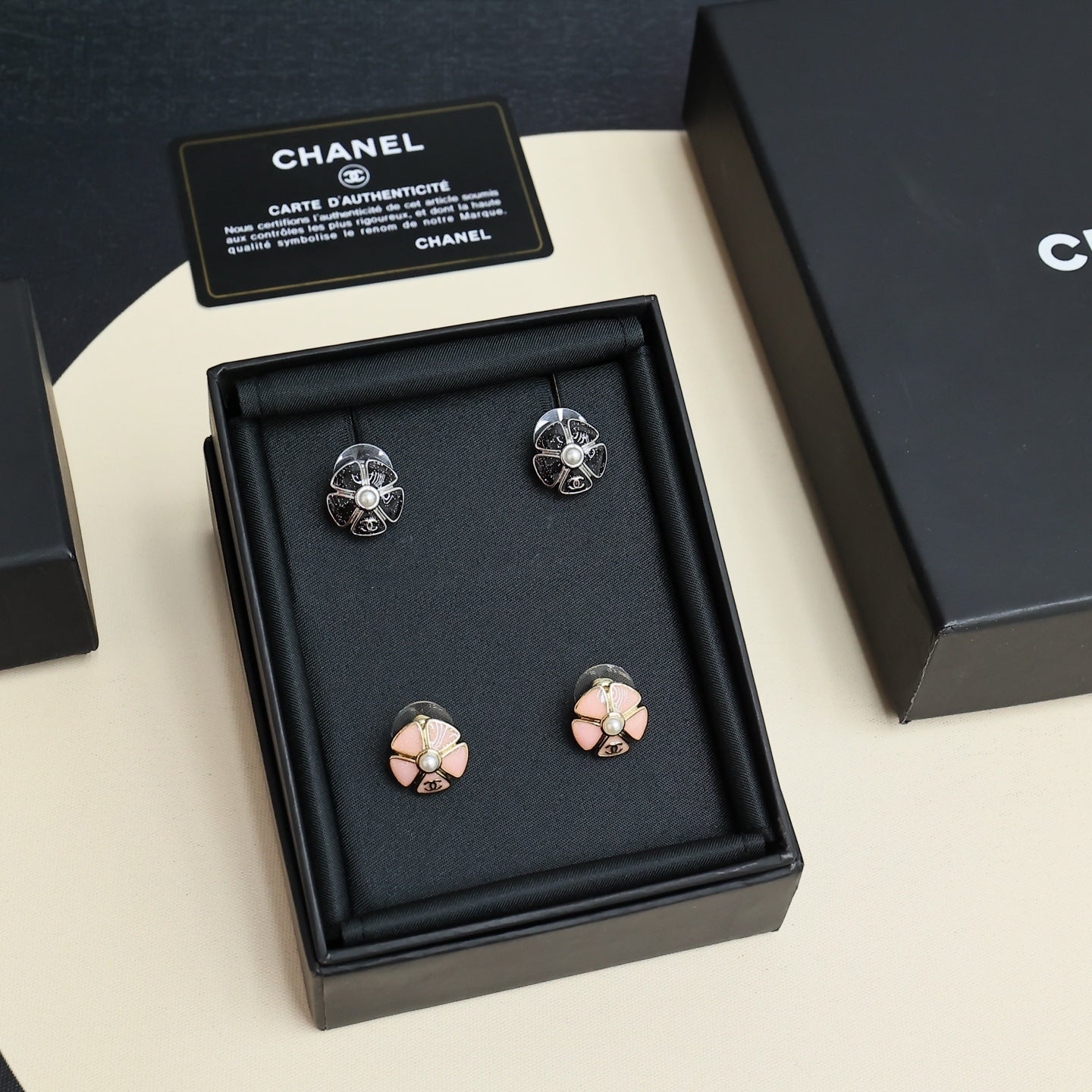 Chanel earring set in box: pale pink and silver-tone floral pearl stud earrings