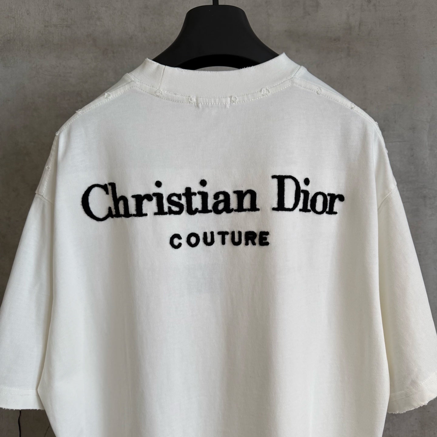 White Christian Dior T-shirt with large back “Christian Dior Couture” logo