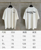 Two white Christian Dior short-sleeve T-shirts shown on hangers