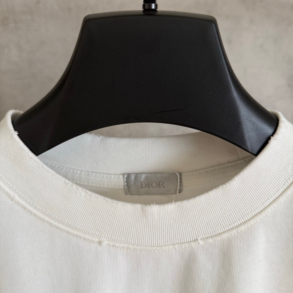 White Dior T-shirt neck label on ribbed crew collar
