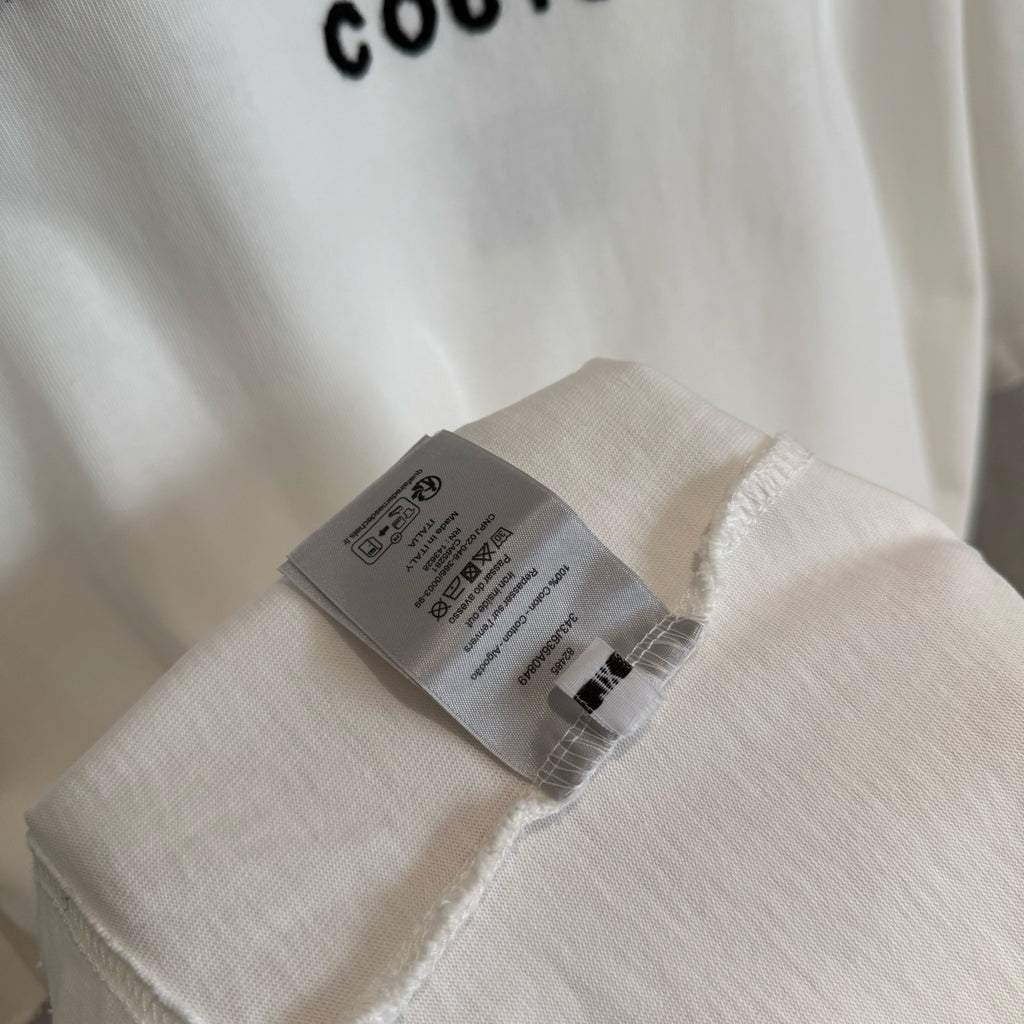 White Christian Dior T-shirt with inner care label on the hem