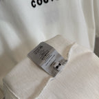 White Christian Dior T-shirt with inner care label on the hem