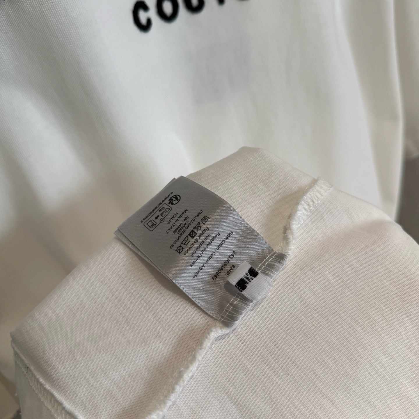 White Christian Dior T-shirt with inner care label on the hem