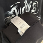 Louis Vuitton black T-shirt with neck label and partial white logo print