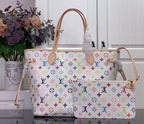 Designer tote bag with multicolor monogram print, center patch pocket and bow accent