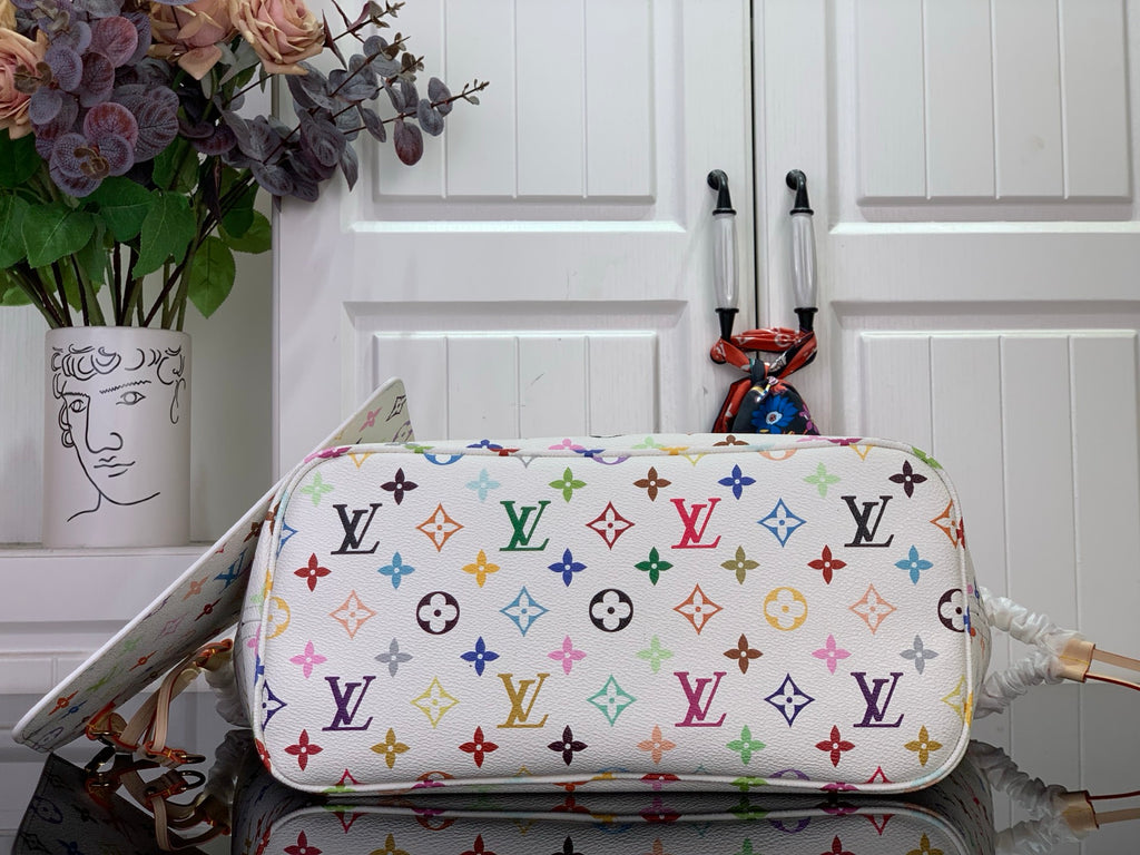 Designer tote bag with multicolor monogram print, rounded top and gold-toned hardware