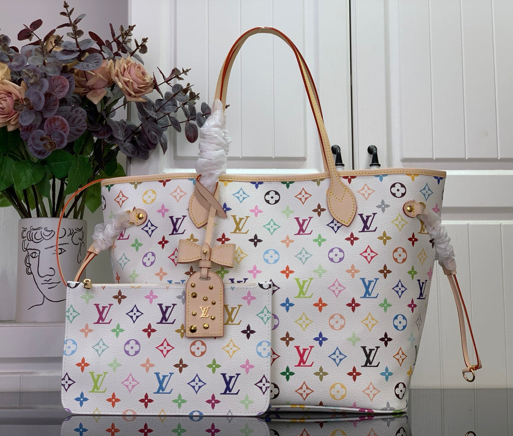 Designer tote bag with multicolor monogram print, beige leather handles and straps