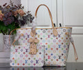 Designer tote bag with multicolor monogram print, beige leather handles and straps