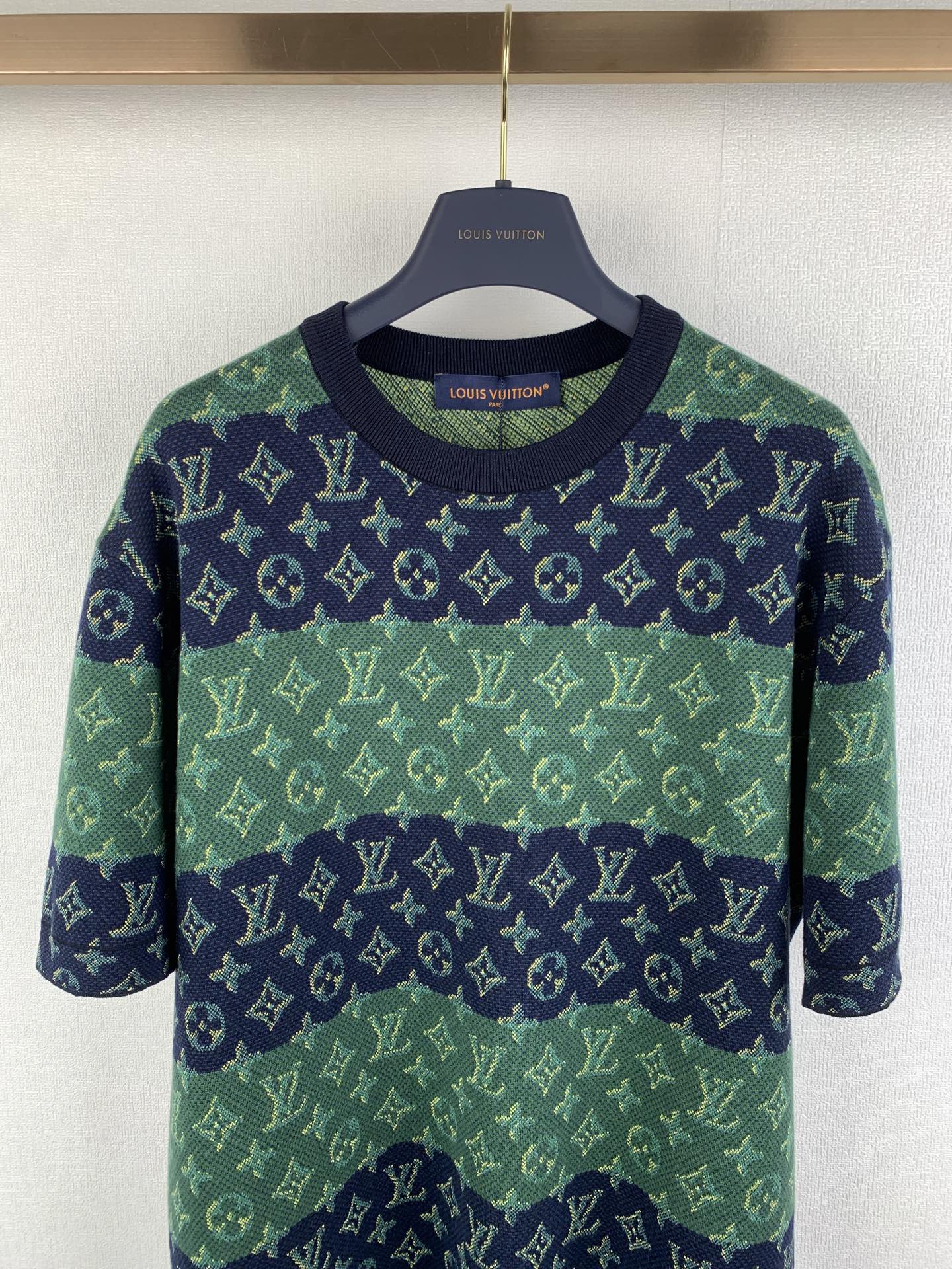 Louis Vuitton knit T-shirt with green and navy monogram bands, long short sleeves.
