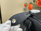 Louis Vuitton bag leather zipper pull with embossed logo patch