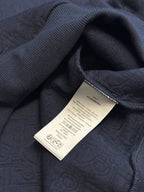 Navy blue hoodie neckline with inner label and knit cuff trim