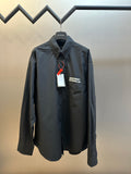 Balenciaga long-sleeve button-up shirt, dark fabric, front button placket and chest pocket