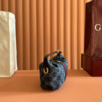 Gucci bag in blue GG canvas with red stripe and gold ring handle