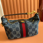 Gucci bag in blue GG canvas with red stripe, gold hardware and shoulder strap