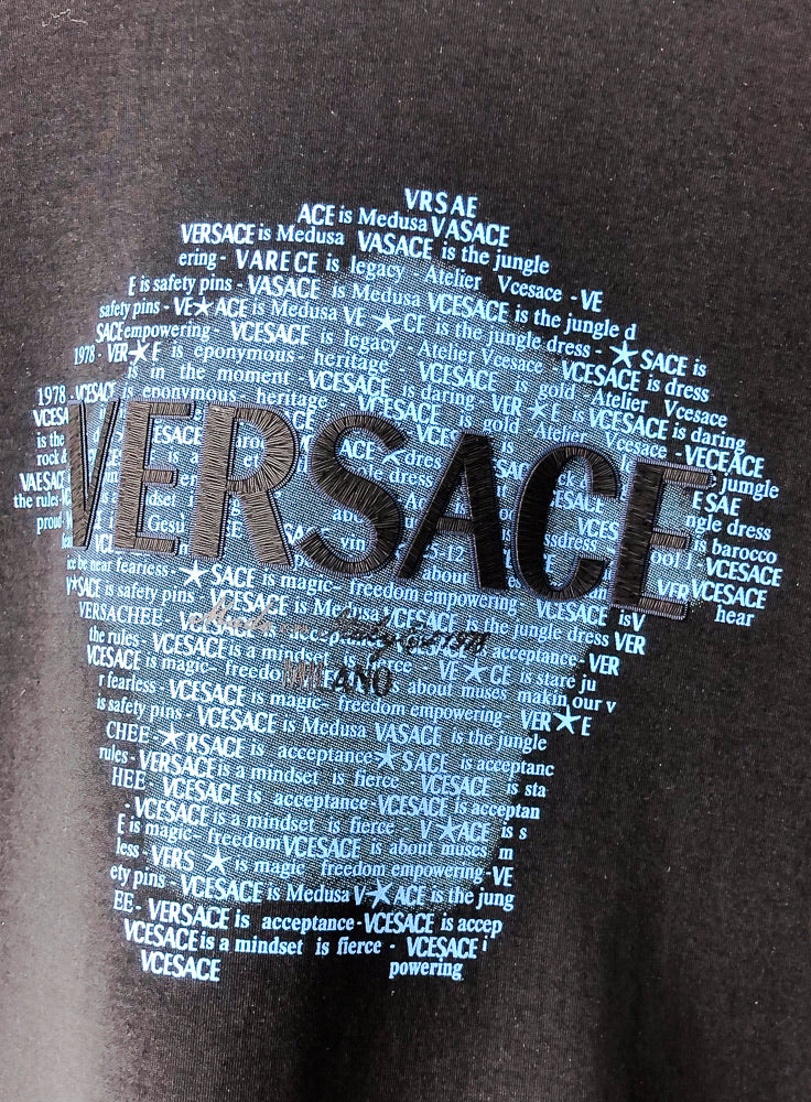 Black crewneck sweatshirt with blue text face graphic