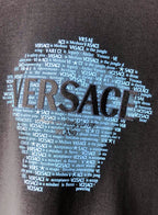 Black crewneck sweatshirt with blue text face graphic
