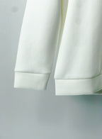 White sweatshirt sleeve and hem with ribbed cuffs and straight bottom