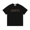 Black short-sleeve T-shirt with multicolor Gucci logo across the chest