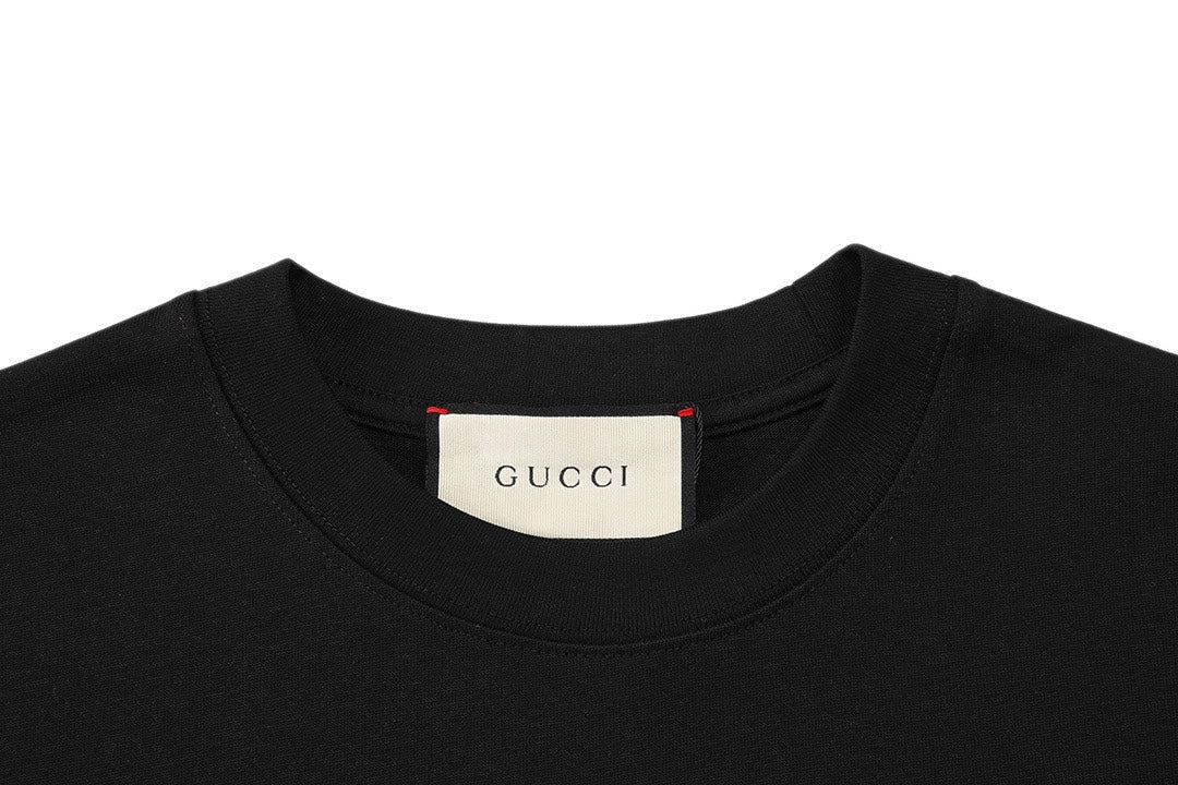 Black crewneck T-shirt with Gucci label at inside collar